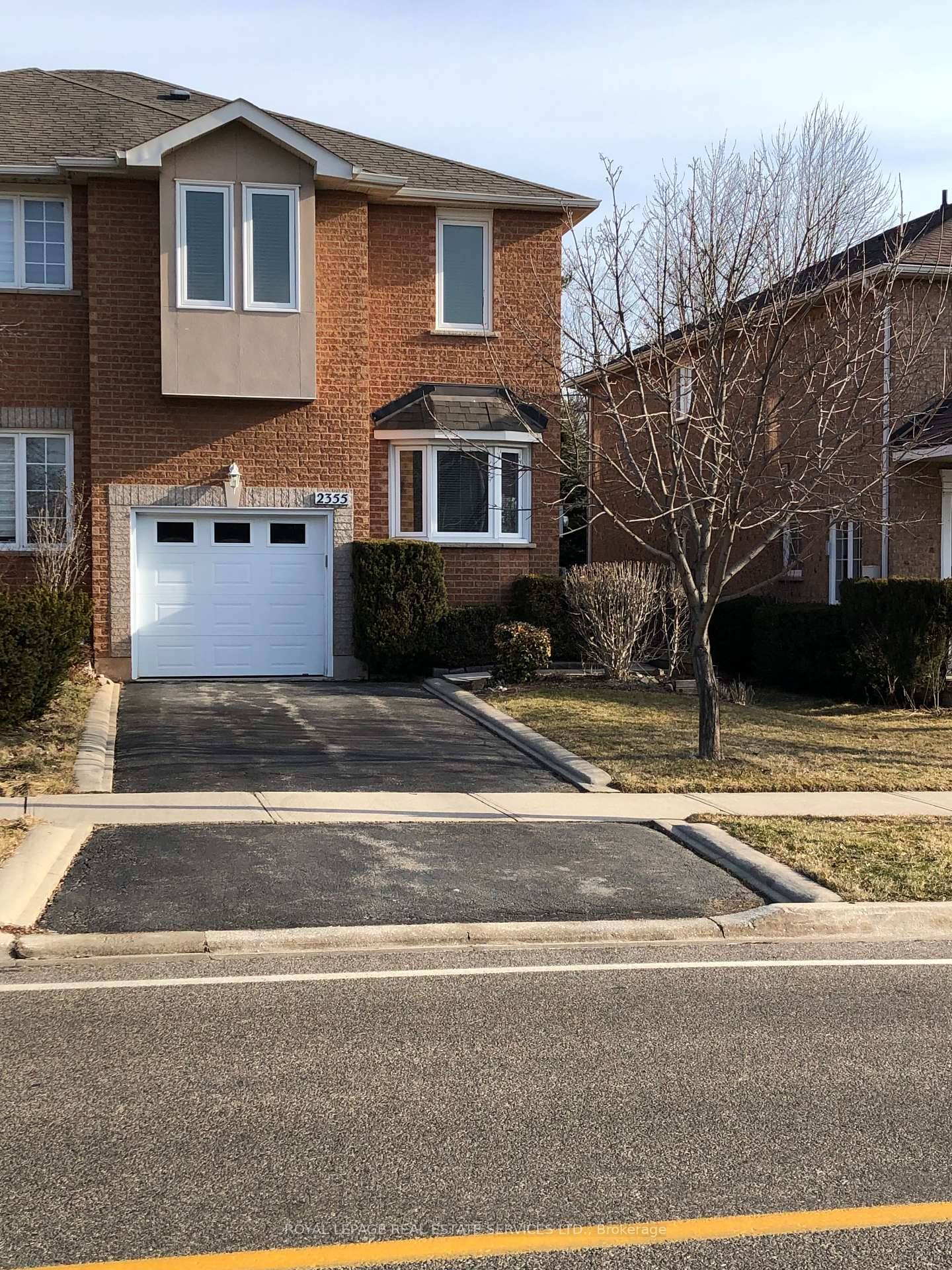 This executive 3 bedroom end unit townhome, situated in the sought after Iroquois Ridge area, offers a picturesque setting backing directly onto Morrison Creek Ravine.