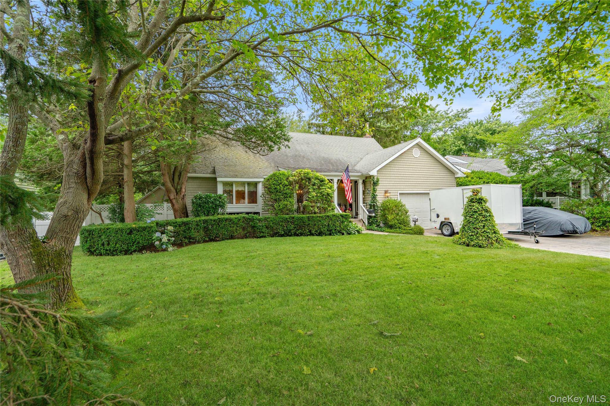 Don't Miss This Charming Babylon Village Home with Expansive, Park Like Yard !