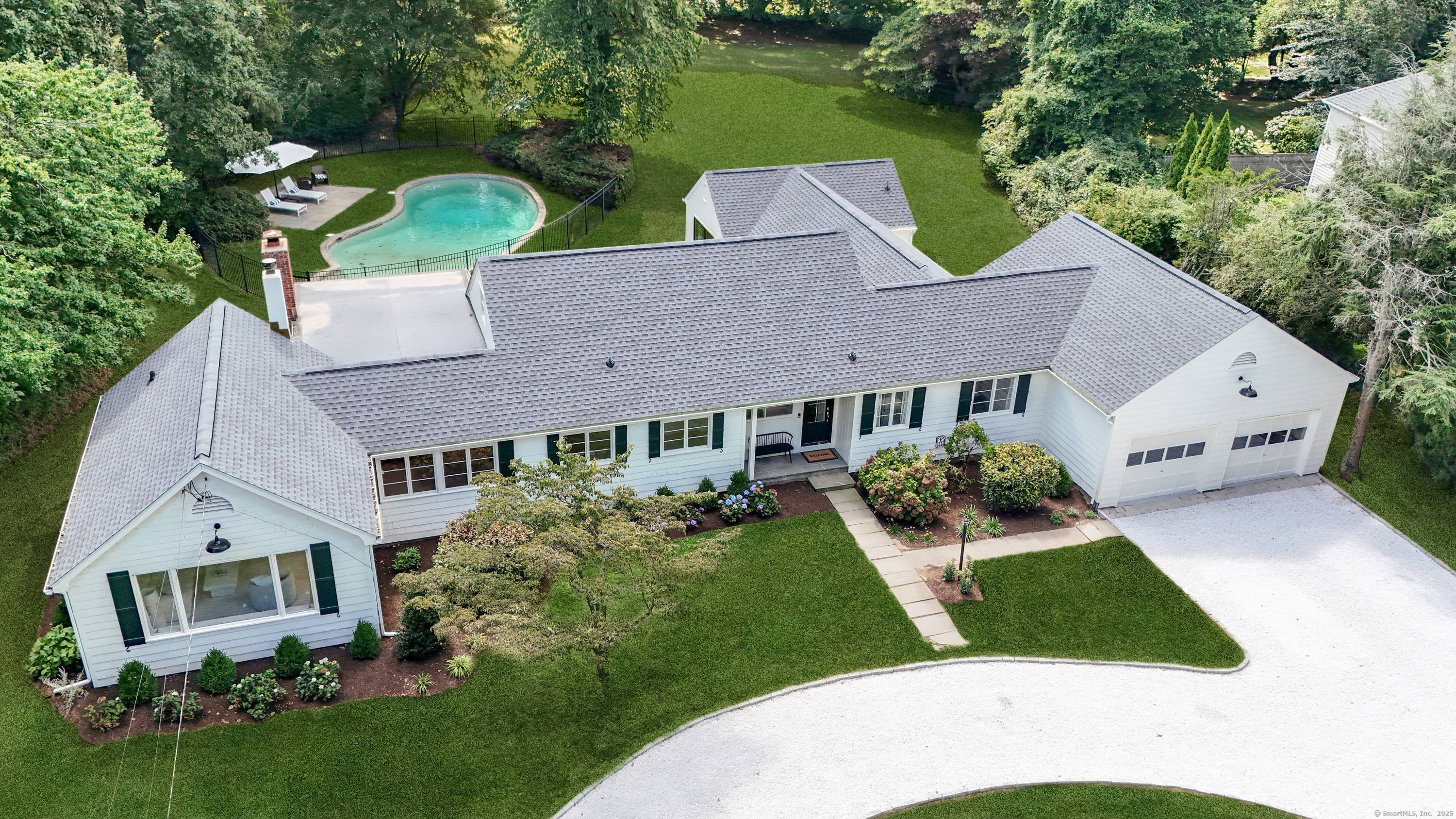 Set on a sweeping acre in Rowayton, this renovated home offers 3, 601 sq.