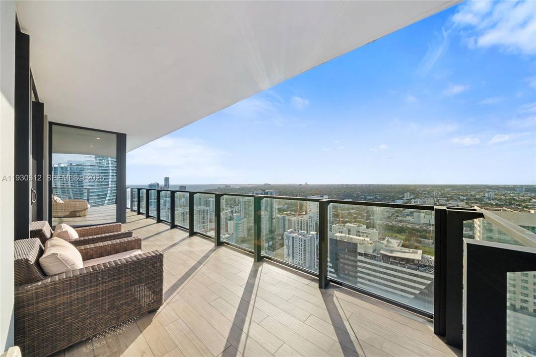 Presenting this unique amp ; rarely available high floor corner three bedroom, three and a half bathroom residence in Reach at Brickell City Centre.