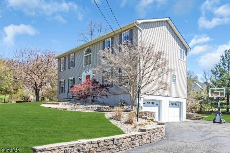 Welcome home to this meticulously maintained center hall colonial !