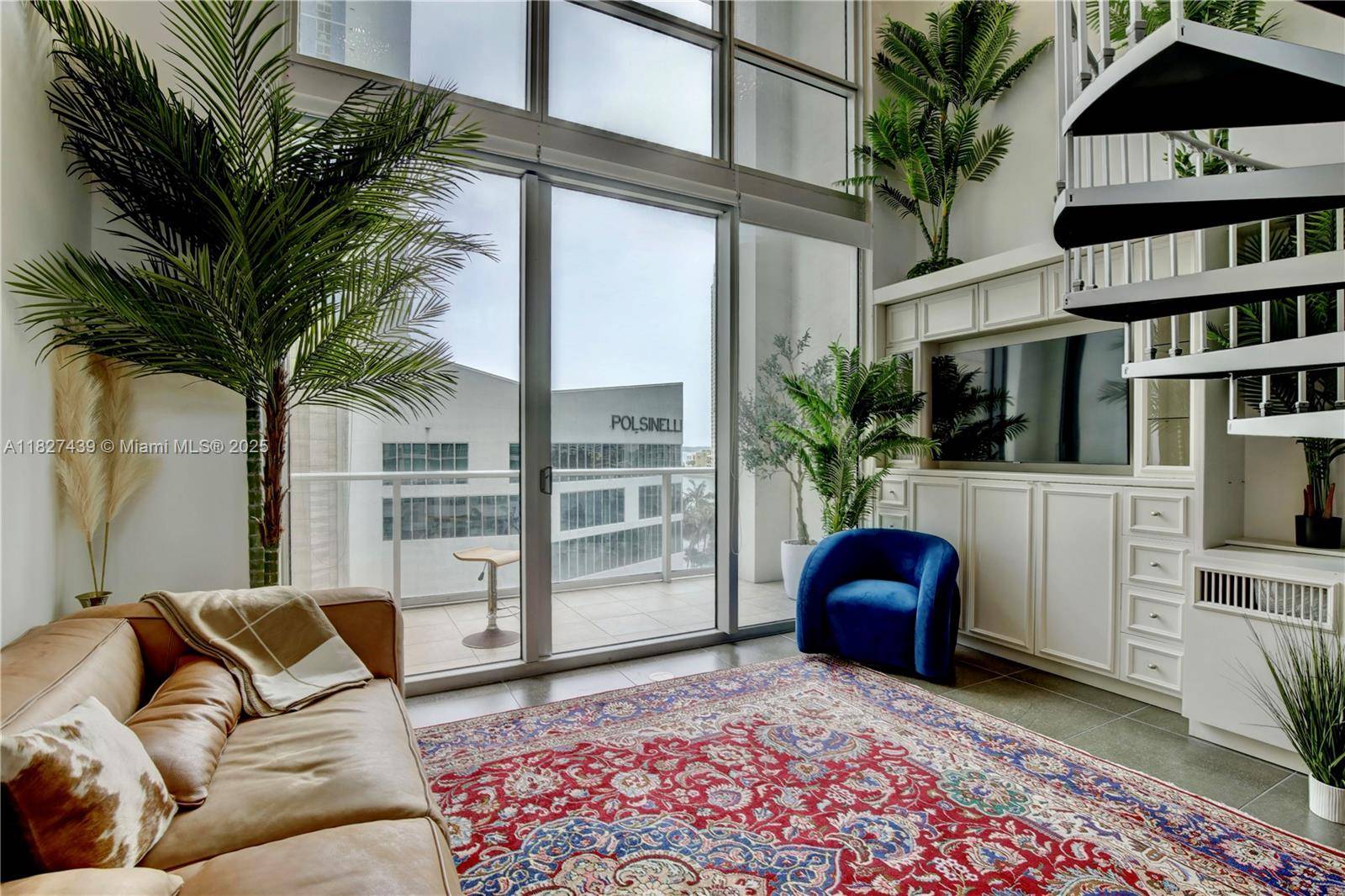 Stunning 2 Story Loft. Experience chic downtown living in this one of a kind, east facing 2 story loft featuring 19'4 ceilings.