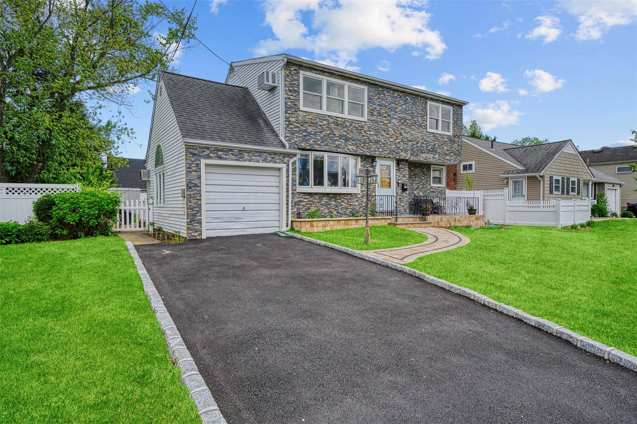 Welcome to this recently renovated beautifully maintained expanded Cape, offering 6 bedrooms and 3 full bathrooms on 1, 722 square feet of thoughtfully designed living space.