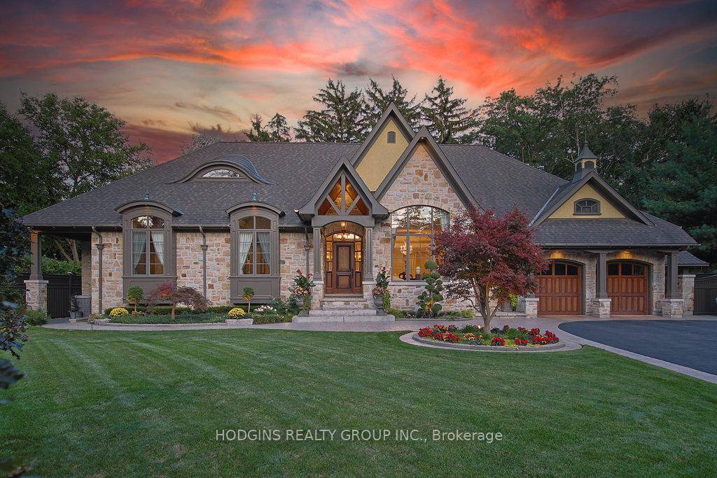 Builders own showcase bungalow on breathtaking 110ft lot in prestigious Gordon Woods.