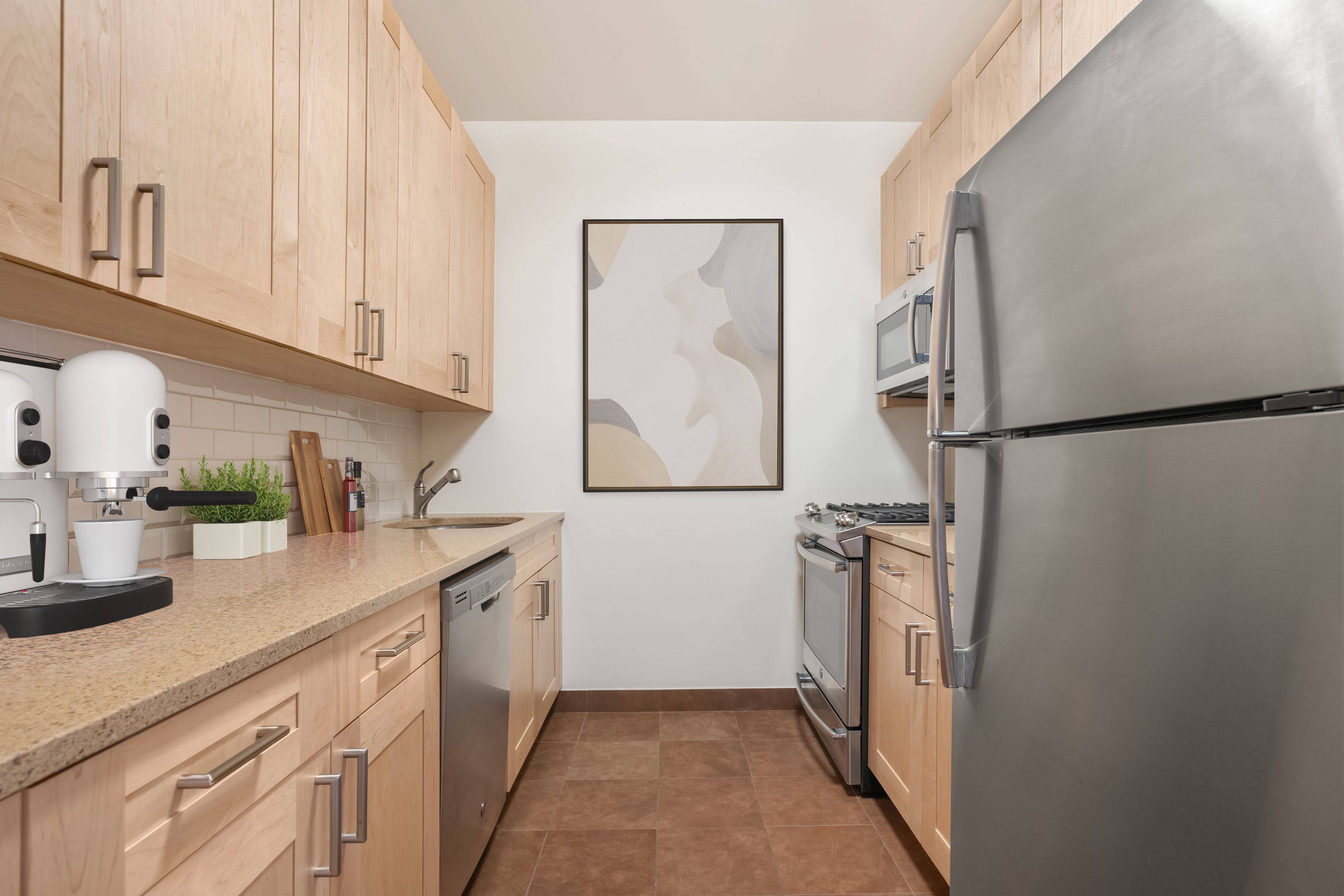 Spacious corner apartment with light filled living room, bonus alcove space with closet and close proximity to bath, and luxurious primary bedroom with en suite bath.