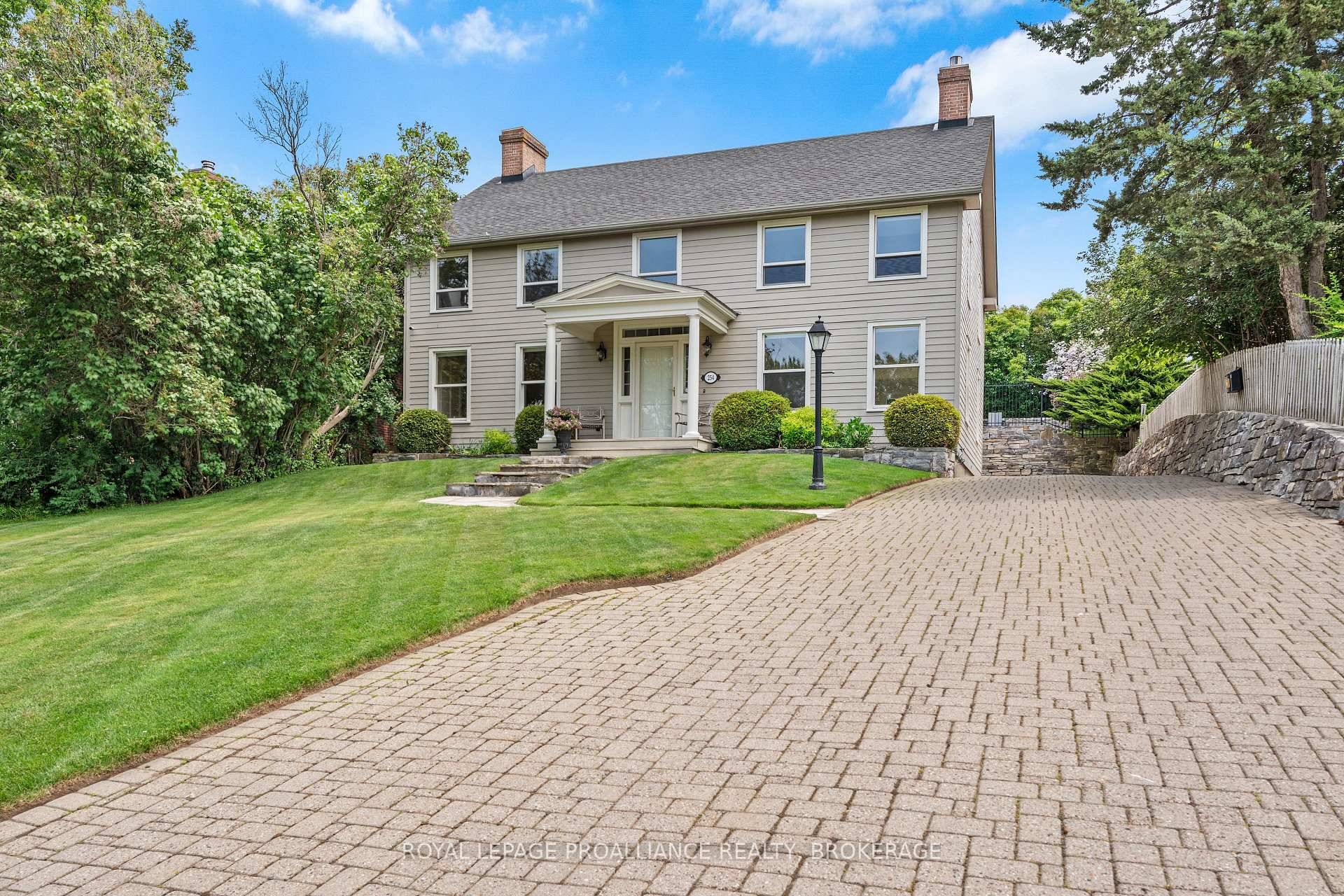 Barriefield Village. A stunning custom build 254 Main Street sits handsomely, with incredible curb appeal, overlooking the Cataraqui River.