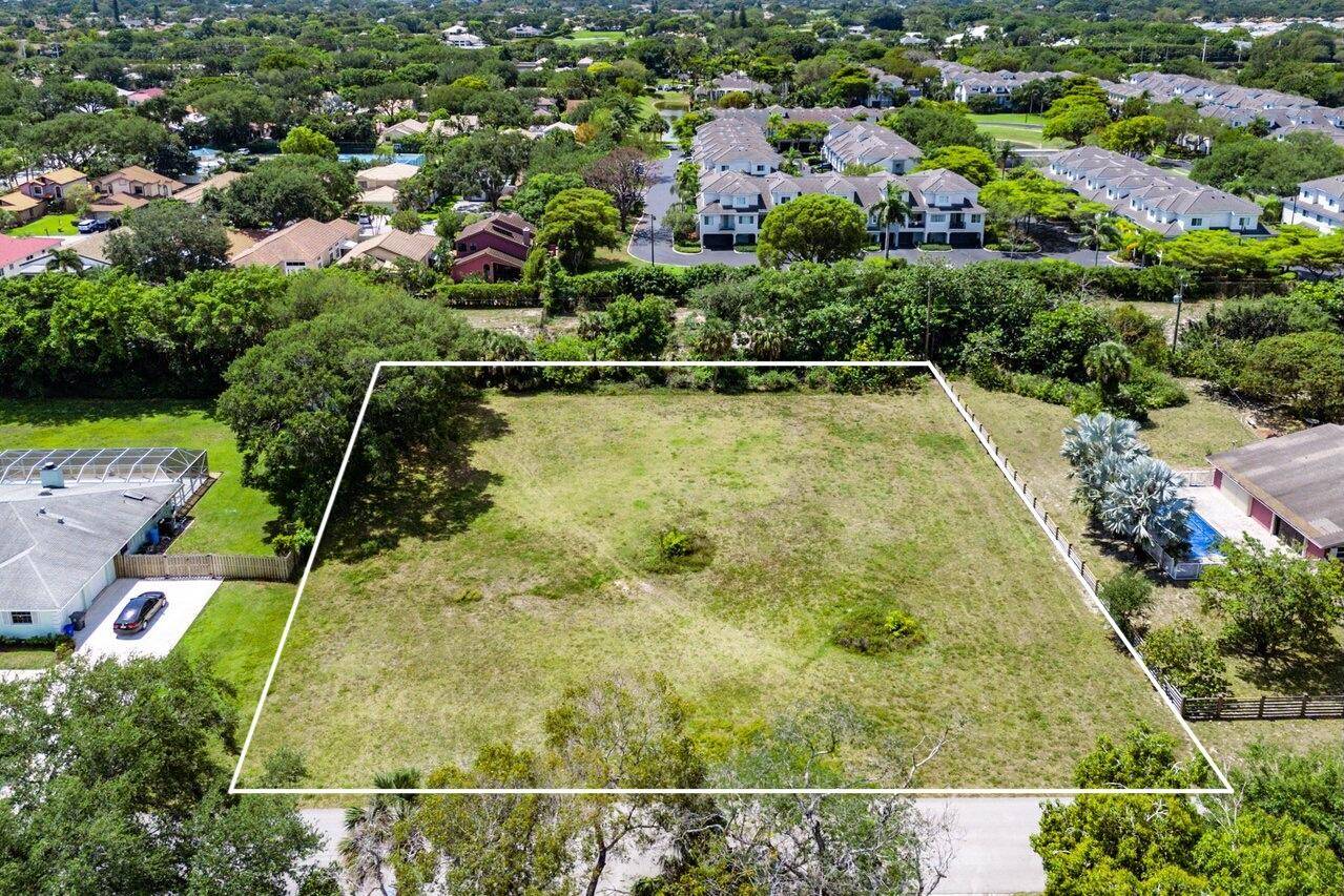 Discover the perfect canvas for your dream home in the sought after Kingsland community of Delray Beach.