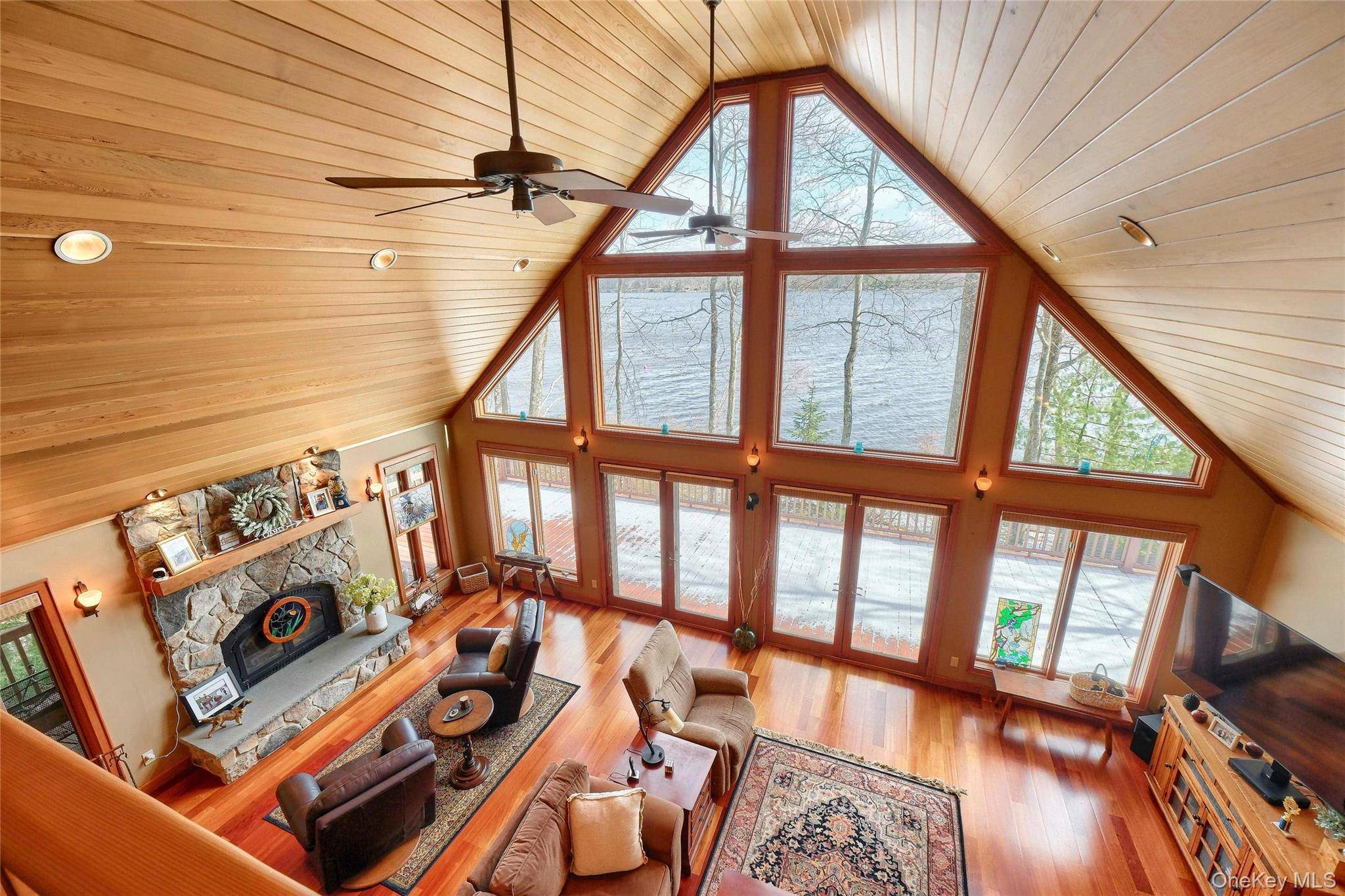 The Builder s Personal Lakefront Masterwork Crafted by its original owner, a meticulous contractor who built it for his own family, this Wolf Lake home captures the widest stretch of ...