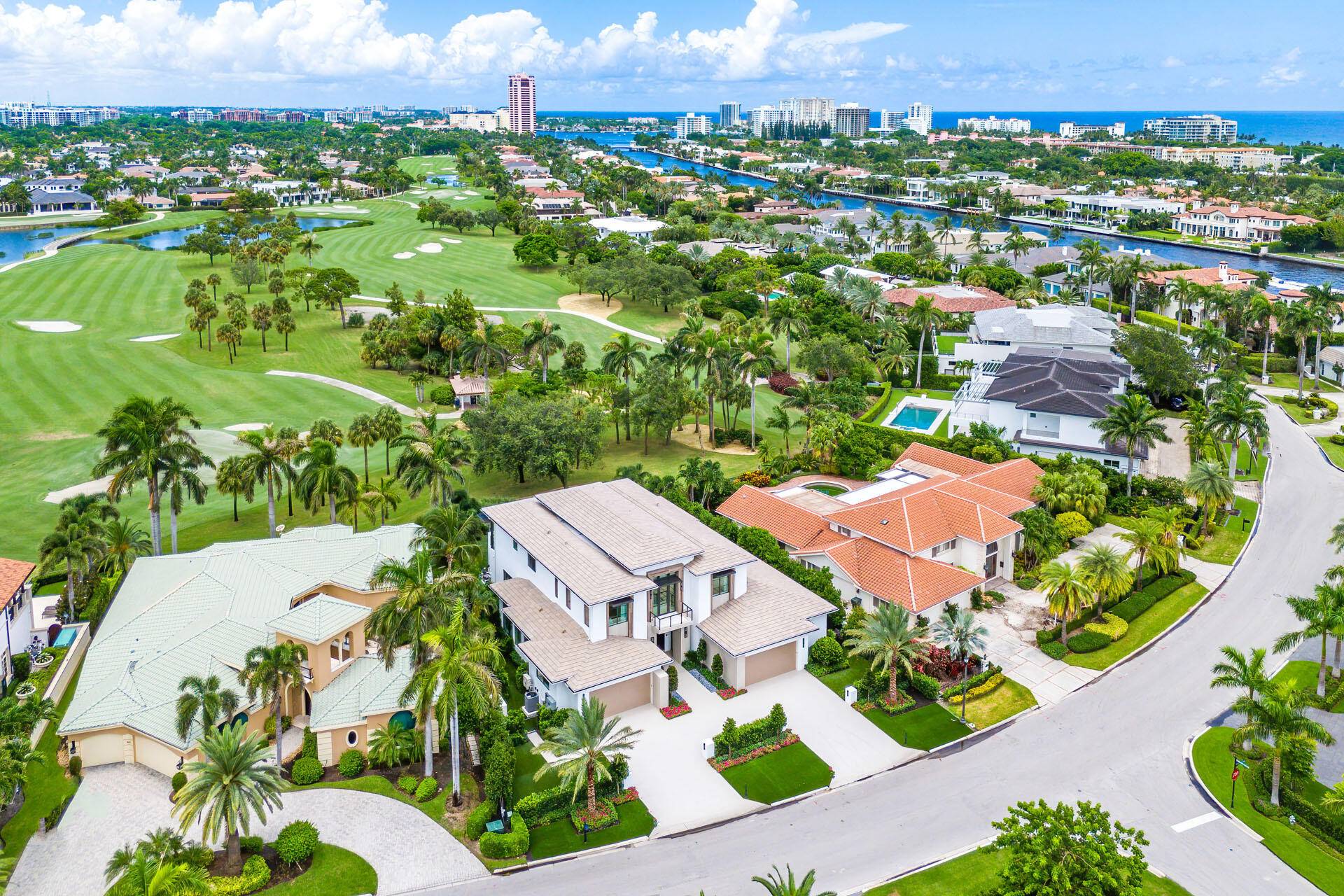 Located in the prestigious Royal Palm Yacht Country Club, this extraordinary residence, meticulously crafted by Bloomfield Construction Inc.