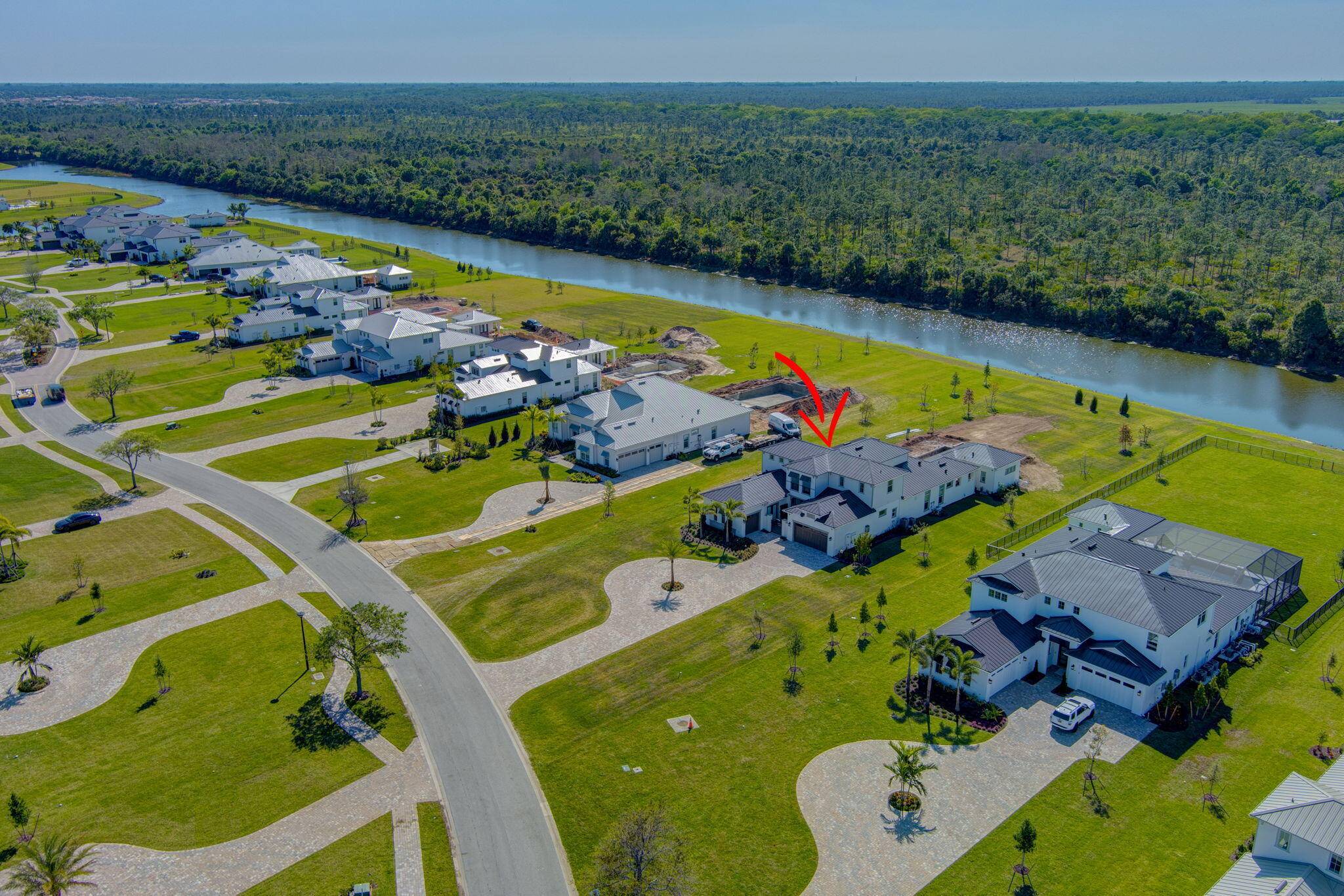 This STUNNING brand new construction, never lived in home, privately nestled on nearly 1 acre waterfront lot in Bridgewater !