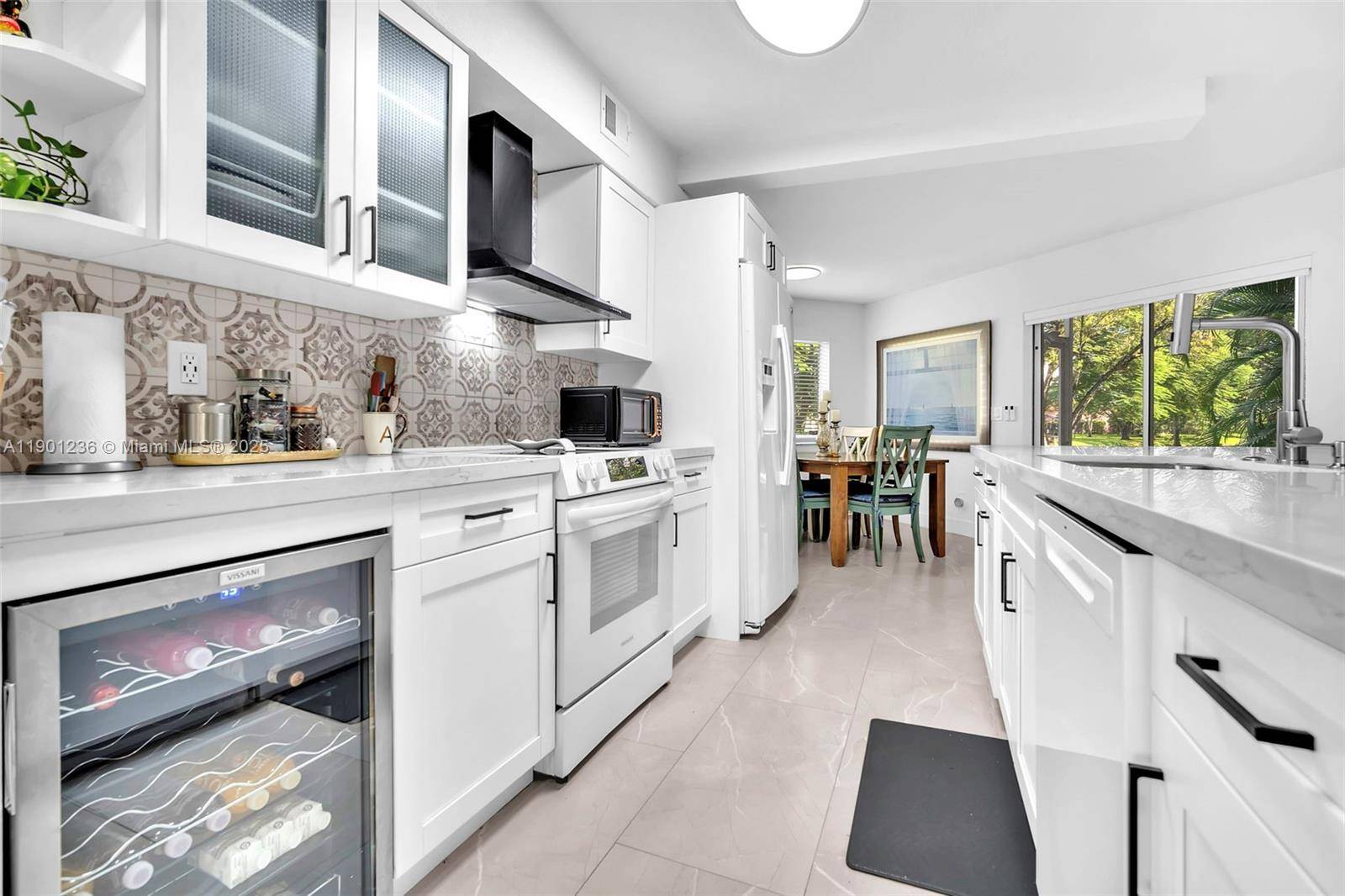 Central Park, Plantation Upgraded 2 2 waterfront property with a multipurpose room amp ; storage.