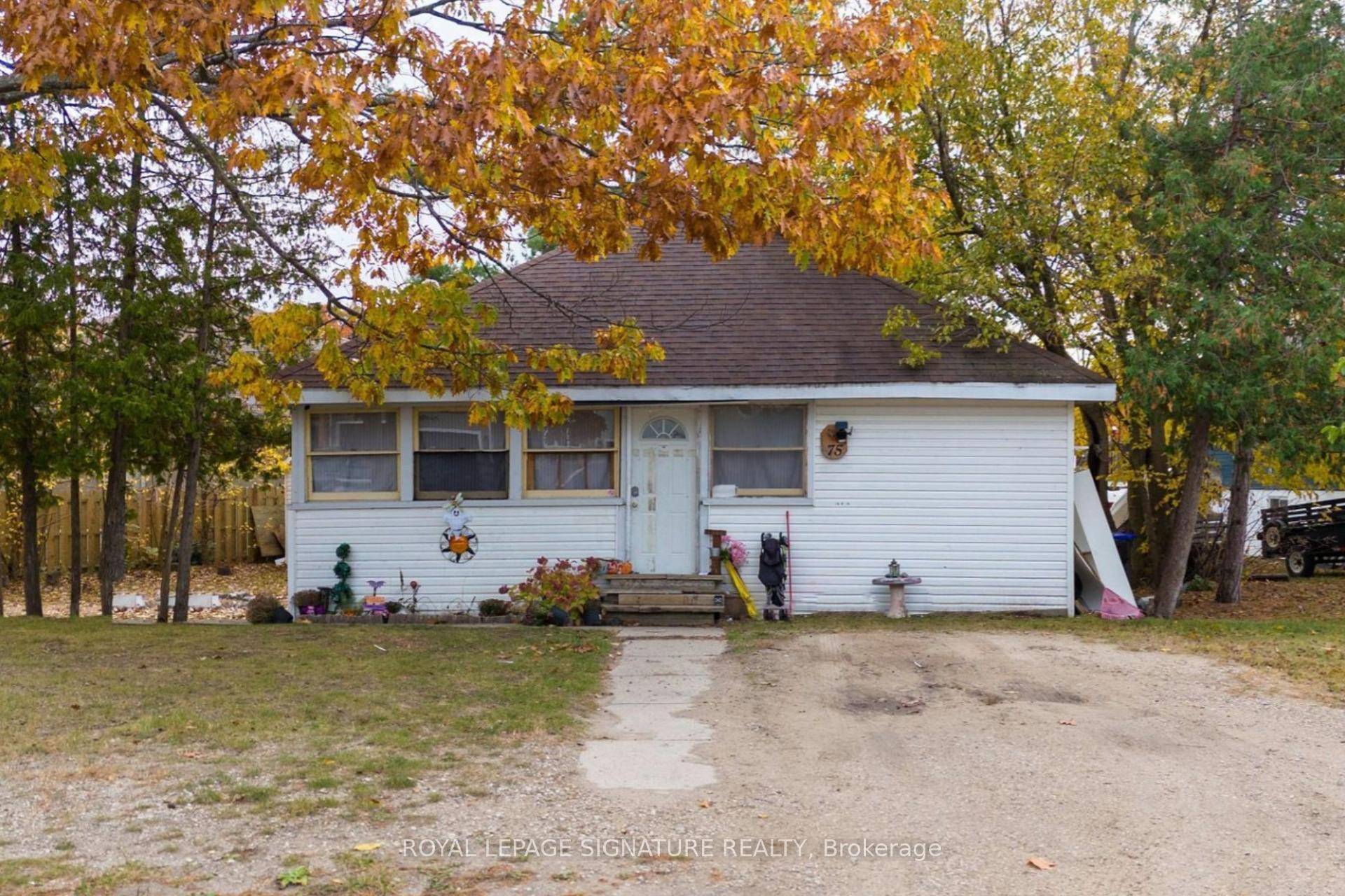 This freshly painted 3 bedroom bungalow is perfectly located just a short walk to the famous sandy shores of Wasaga Beach Area 2.