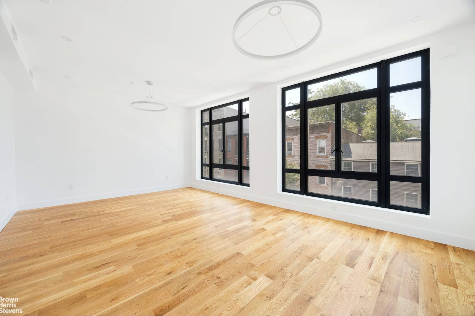 Prime Williamsburg Expansive and Private Modern Triplex with Two Balconies and Two Roof TerracesLocated on North 1st Street just off Berry Street, this massive triplex is for entertainers and outdoor ...