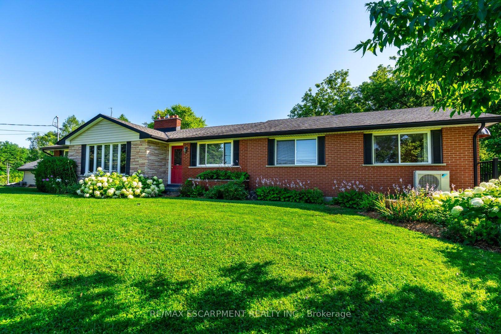 Welcome to this one of a kind country property sitting on 10.