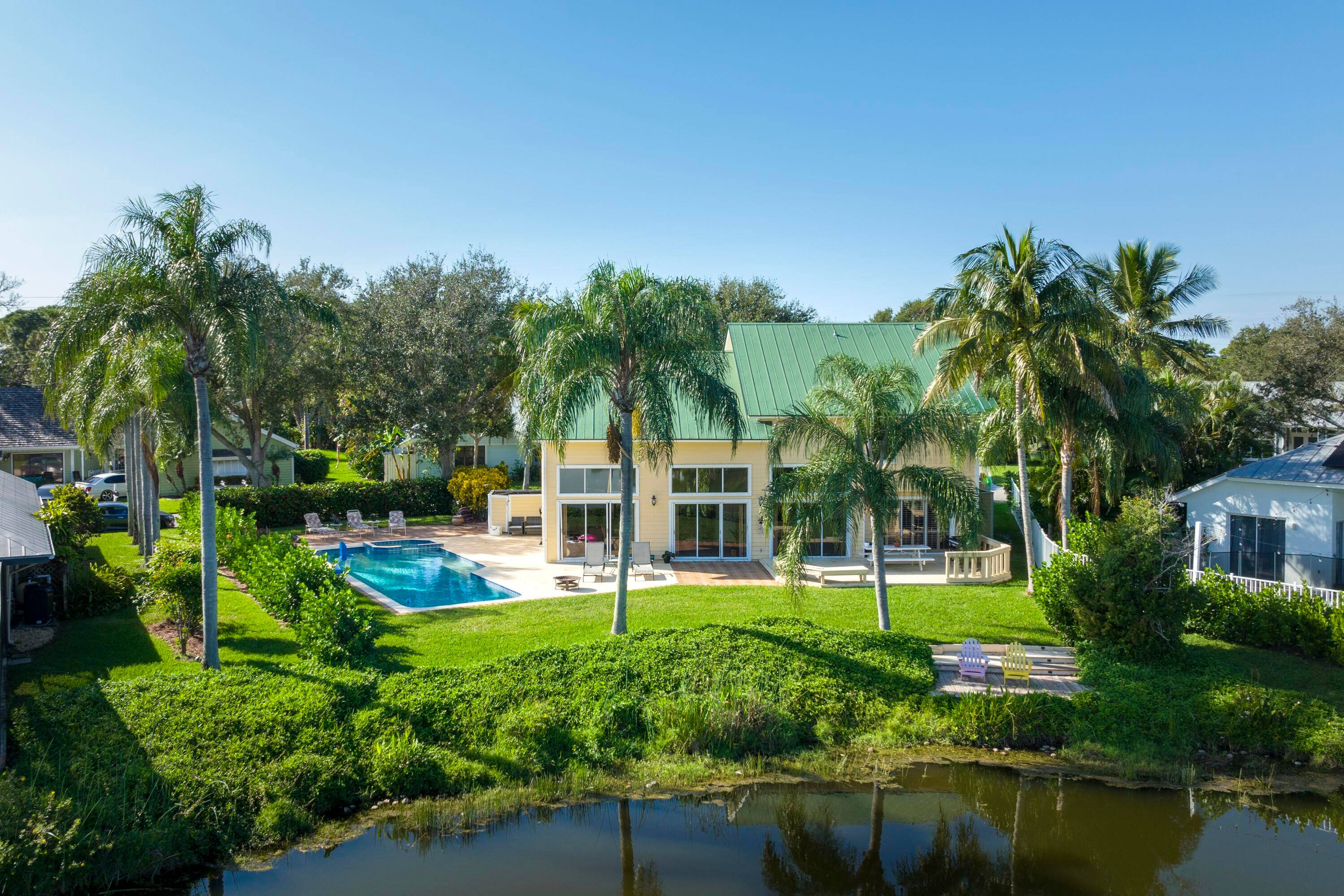 Bright, Key West style home in the desirable Jupiter Narrows community of Hobe Sound, just two miles from the beach.