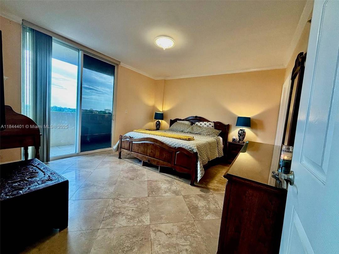 Oversized 2 bed, 2 bath corner unit with den in the well managed Catalonia Condo.