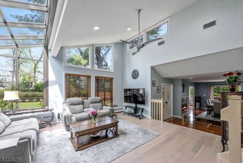 Stunning custom home gracefully set on a serene 1.