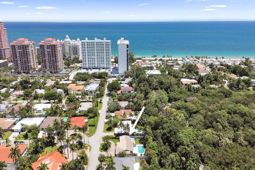 Exquisite move in ready beach walkable home in Dolphin Isles.