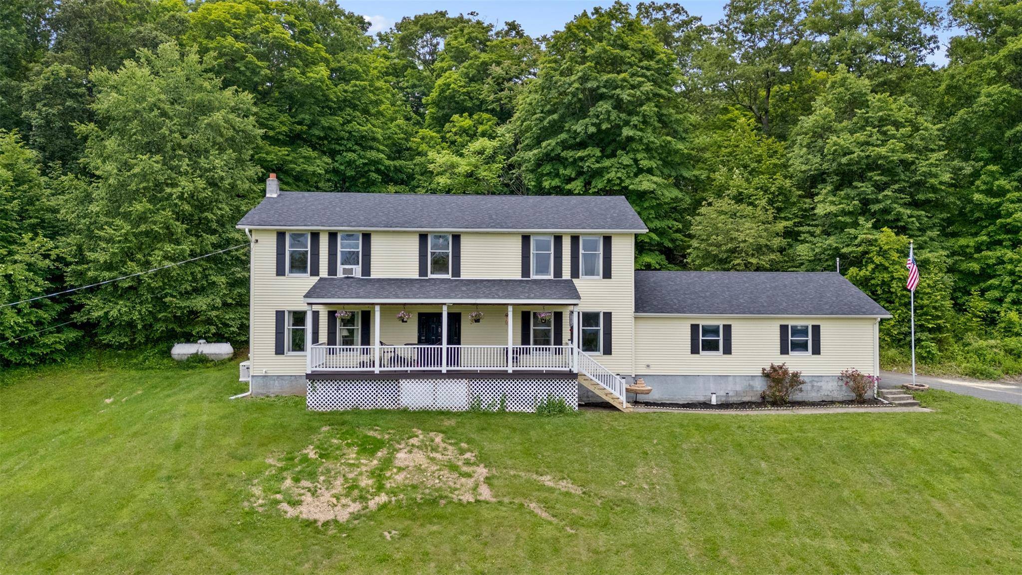 Motivated Seller ! Set on just over 13 wooded acres with long range eastern views toward Dutchess County, this spacious Colonial offers privacy, updates, and value in the New Paltz ...