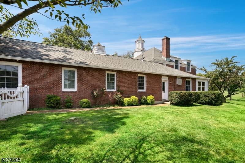 Magnificent 8. 7 Acre Building Site with Storied Carriage House, formerly the stable complex of United States Golf Association.