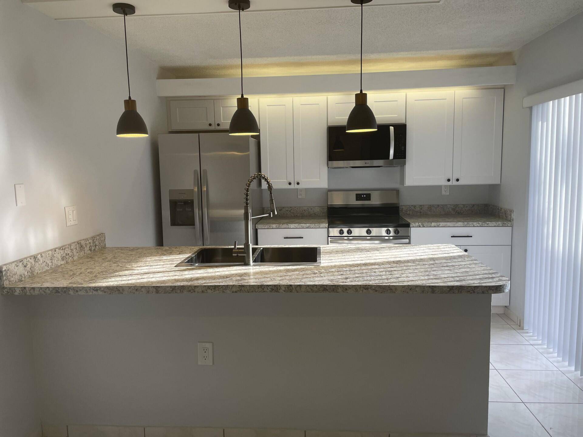 Beautifully renovated 2 story townhome ready for move in !