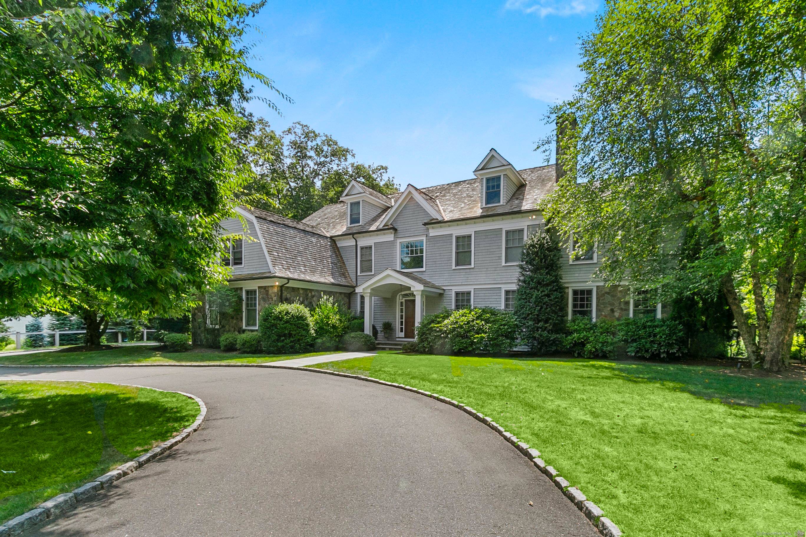 This beautiful home with undeniable curb appeal crafted by Andy Frank, sits on a flat, centrally located acre in the heart of Westport.