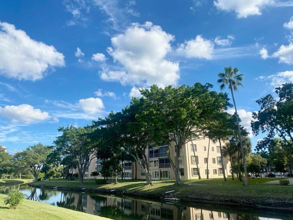 Freshly Painted and spacious 2 2 unit with tile floors, granite countertops and in unit laundry.
