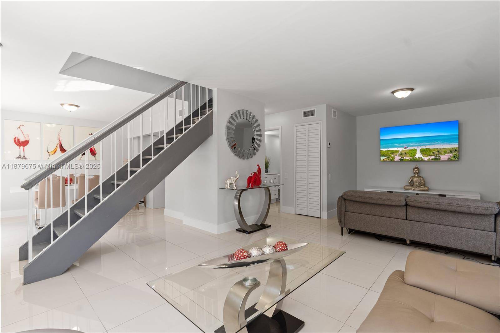 Light filled and inviting, this 3 bedroom, 2 bath townhome features an open layout with living and dining areas flowing into a beautifully updated kitchen.