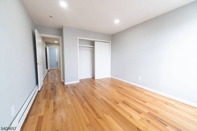 Renovated two family home featuring two units, each offering 2 bedrooms and 1 full bath.