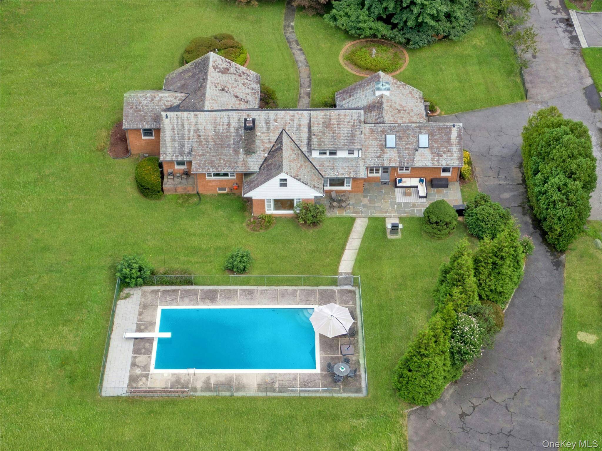 Situated on a level 1. 06 acre lot, this exceptional property offers a main house, guest house, and pool an ideal combination for everyday living and entertaining.