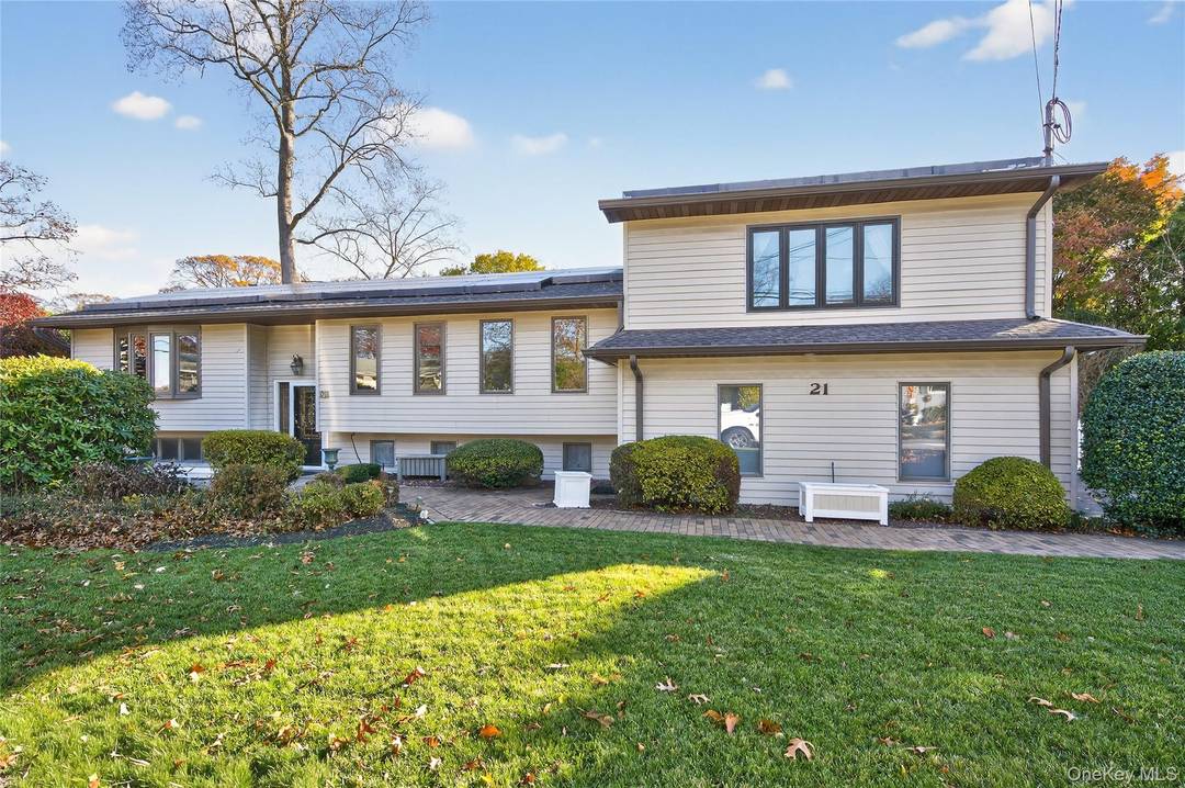 Welcome home to this beautifully expanded High Ranch featuring 5 spacious bedrooms and 3 full bathrooms.