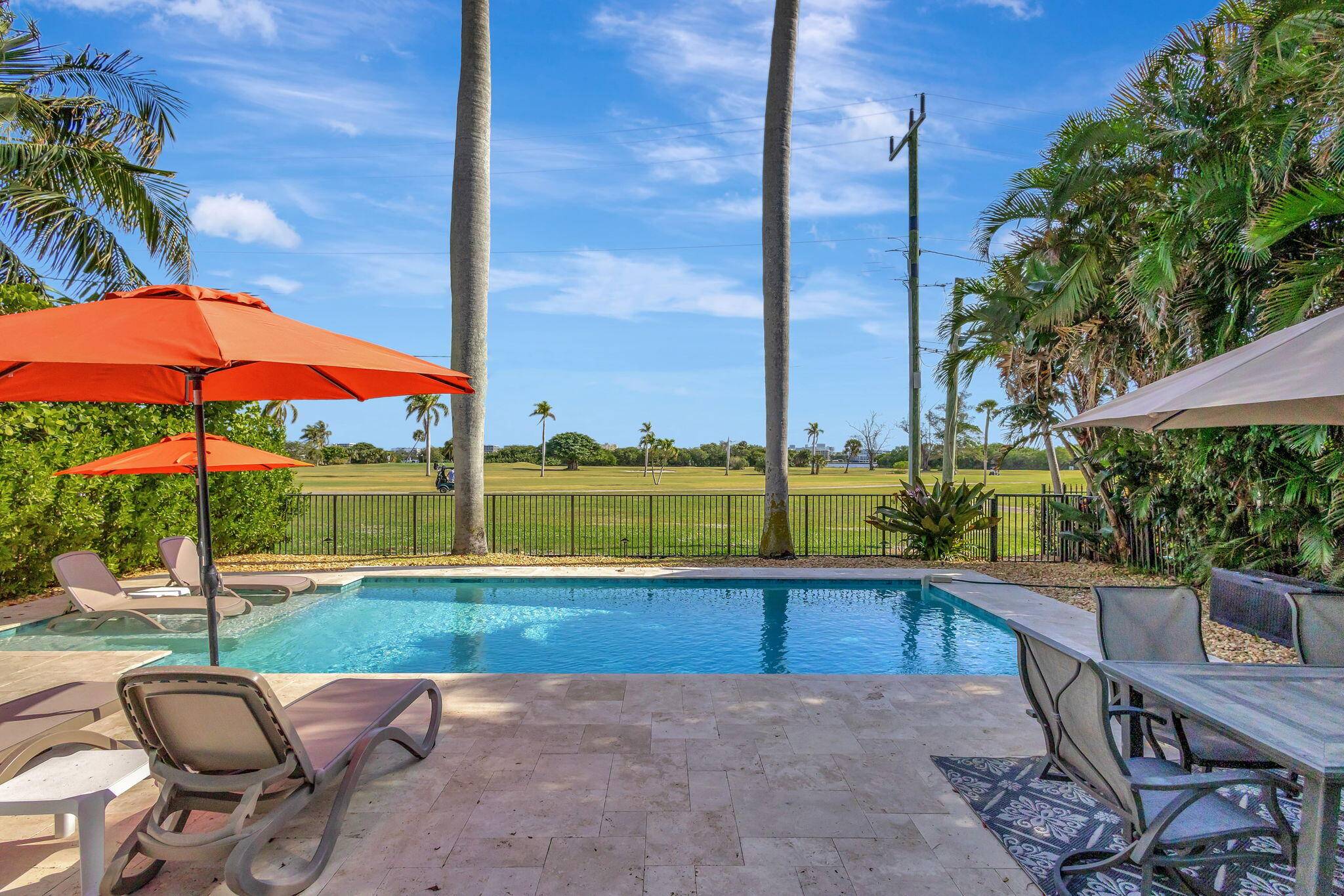 This luxurious 3 bedroom 2 bath home sits directly on famed Lake Worth Golf Course and has direct Intracoastal views from the spacious back yard that features a brand new ...