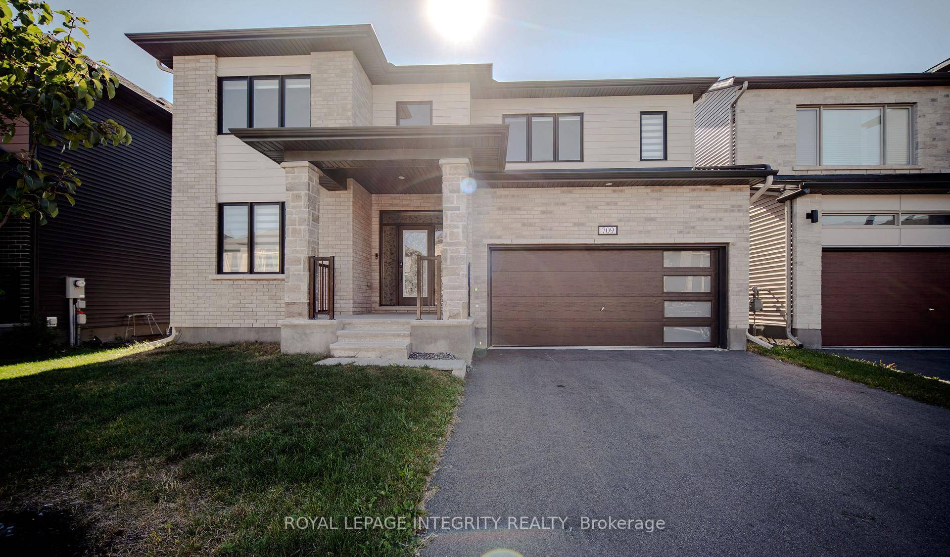 No Rear Neighbours ! Discover the epitome of luxury in this exquisite newly built 2023 4 bedroom, 4 bathroom residence, complete with a walkout basement in the prestigious Stonebridge community.
