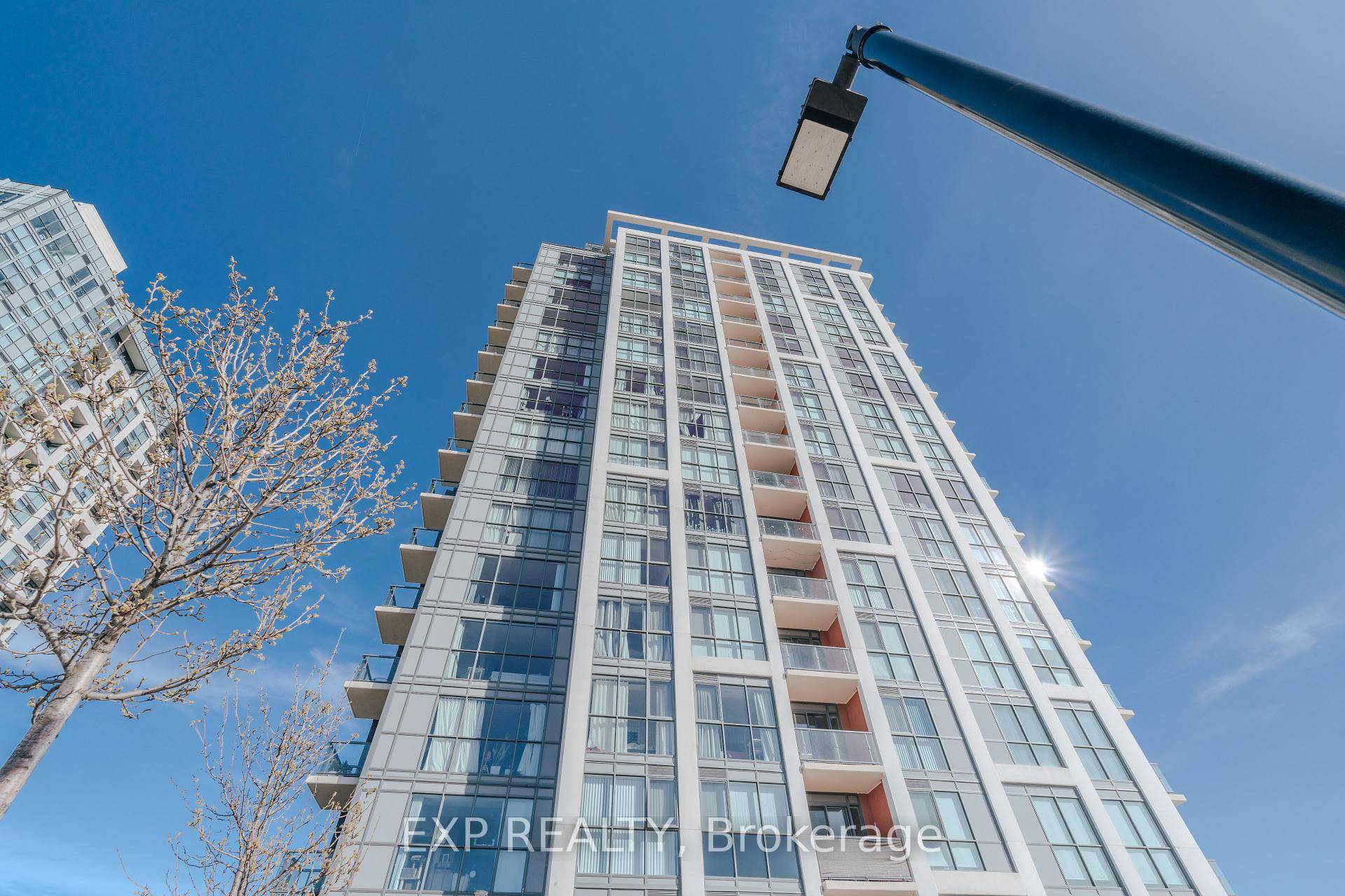 Welcome to Unit 1104 at 50 Thomas Riley Road, a sophisticated corner suite in the esteemed Cypress at Pinnacle Etobicoke.