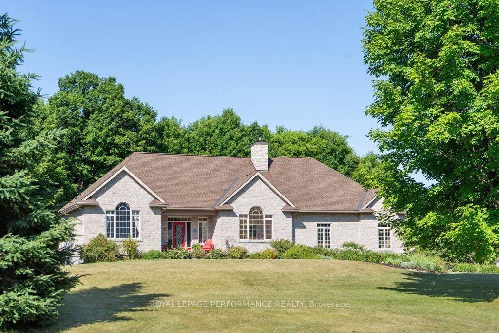 Welcome to 2830 Torwood Drive, a sprawling 3 1 bedroom bungalow set on a stunning 3 1 2 acre property in Dunrobin, surrounded by majestic maple trees and bordering a ...