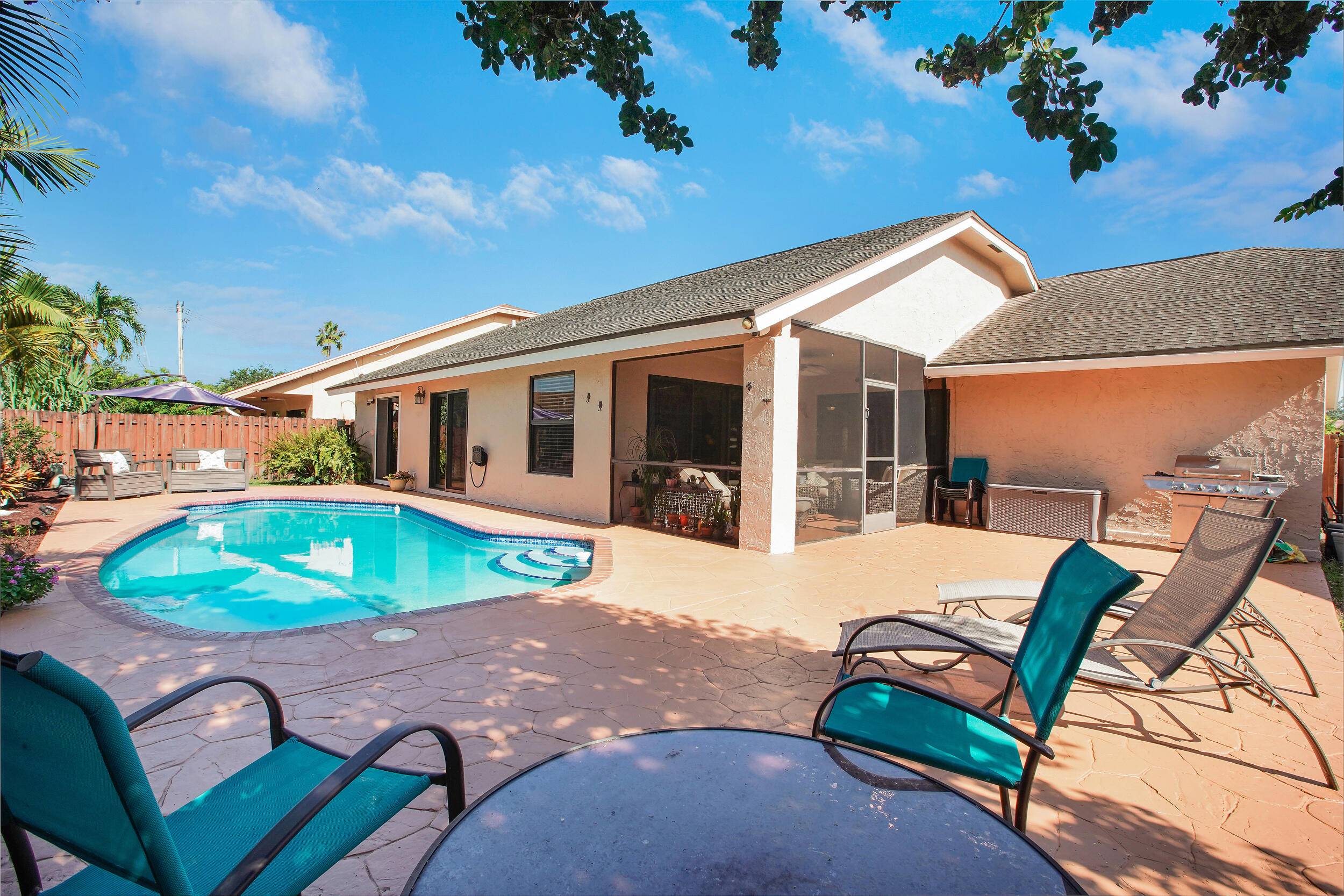 YOUR HOME IS HERE ! ! This property has it all 4 BD 3 BA, an open concept kitchen with wood cabinets, granite countertops, and stainless steel appliances.