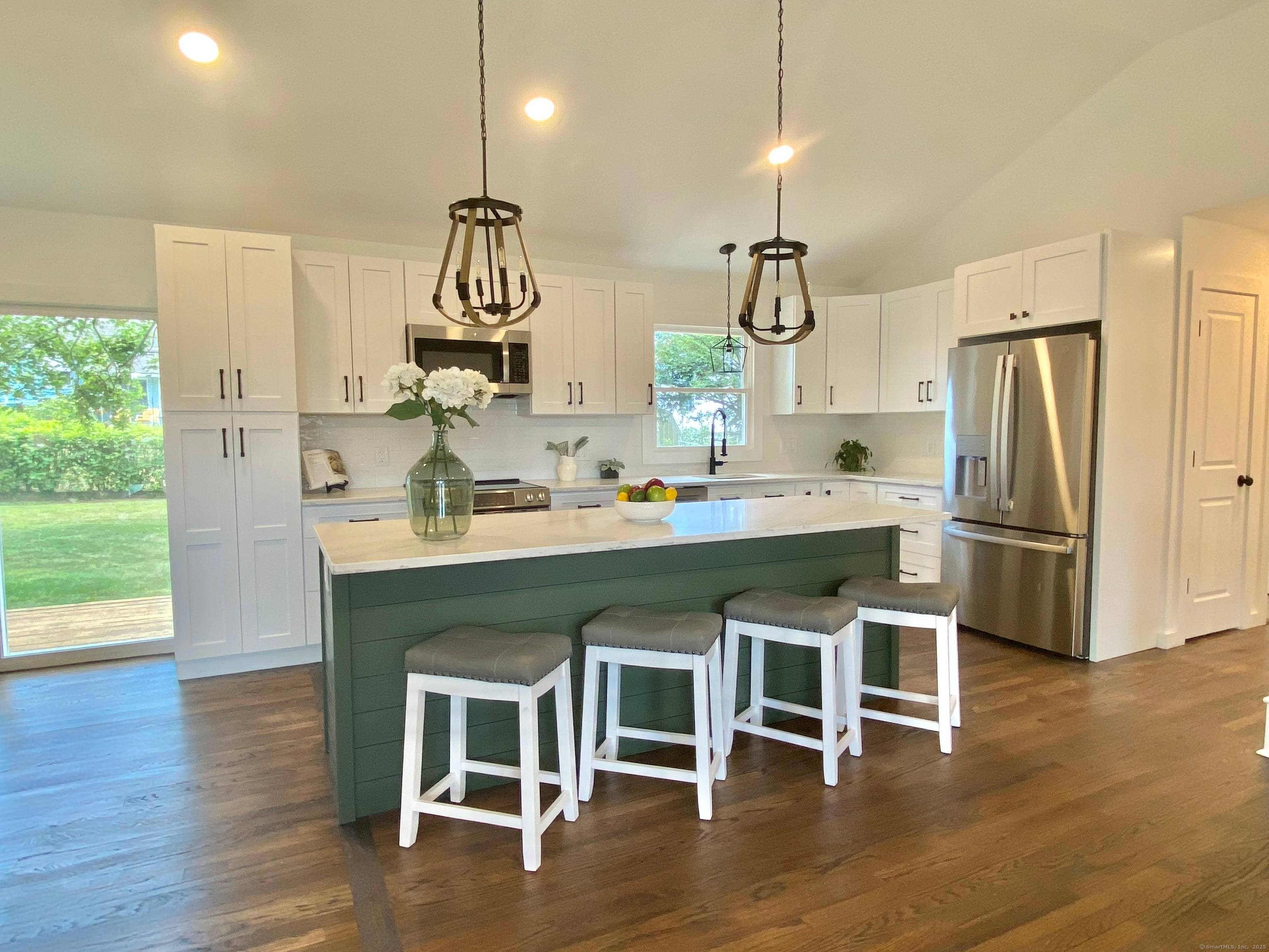 Welcome to this stunning upscale reimagined modern ranch style, 3 bdrm, 2 full bath home on a cul de sac, which is designed to impress at every turn.