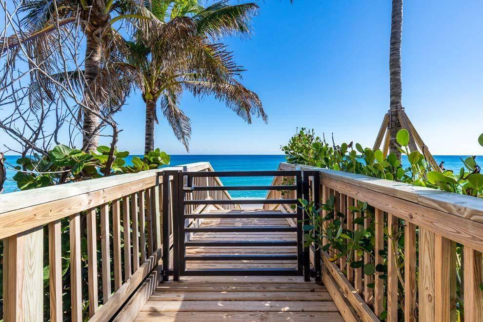 Exceptional Opportunity in Highland Beach Steps from the Atlantic Ocean with a BRAND NEW ROOFWelcome to coastal luxury just moments from the sand.