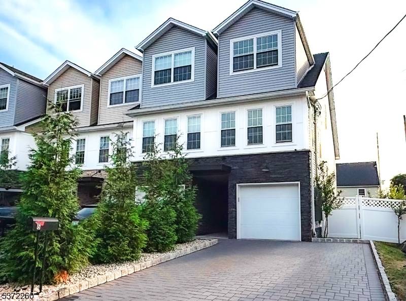 Discover modern living in this stunning end unit townhome built in 2020.