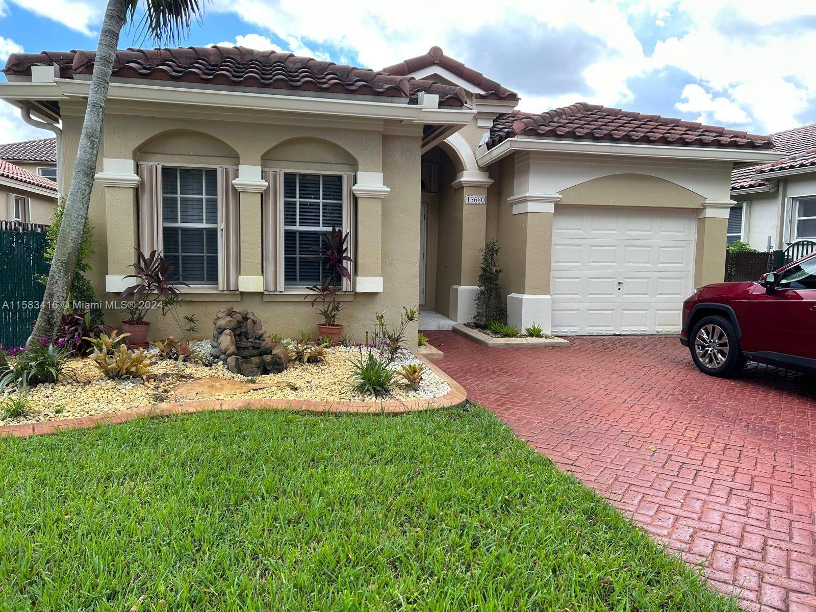 Gorgeous 3 2 plus den single story home with screened in swimming pool featuring new diamond bright finish and elegant travertine flooring.
