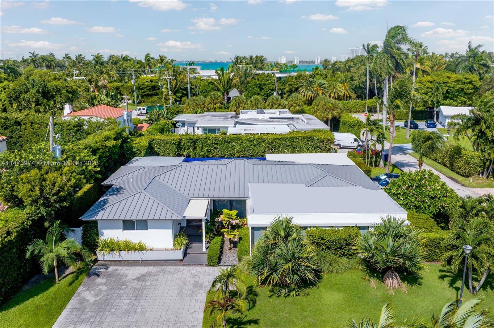 Located on one of the most private and prestigious streets in Miami Beach.