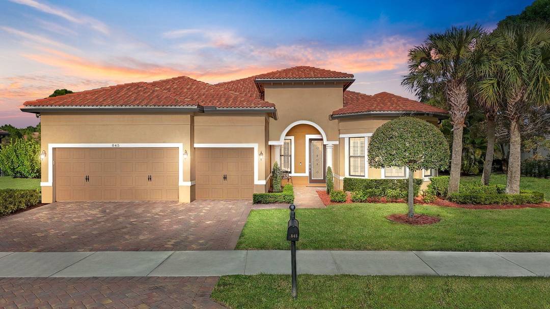 Immaculate custom built lakefront home in the gated Copperleaf community.