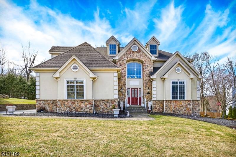 Rarely does a home offer this combination of space, style, and scenery, located on a private cul de sac.