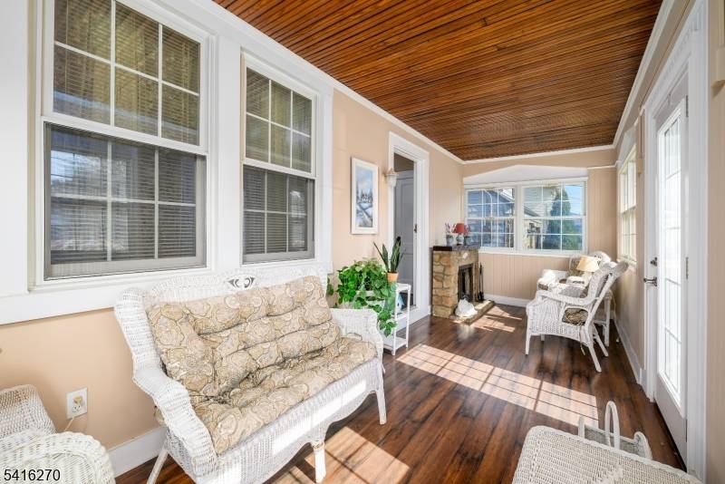 Battle Hill section colonial featuring an eat in kitchen with dishwasher, refrigerator, gas stove and microwave.