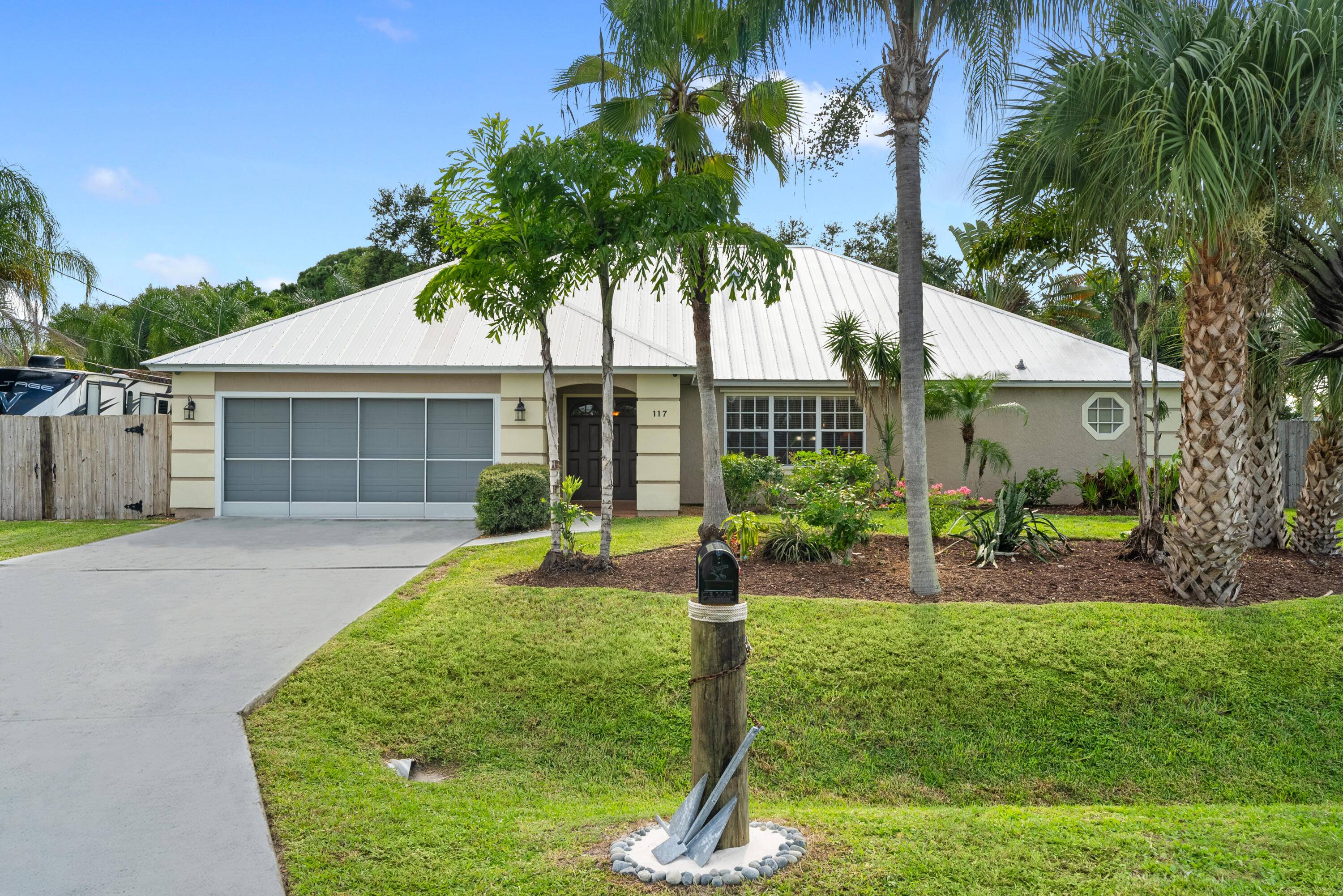 Enjoy serene water views from the screened patio, heated pool and hot tub ideal for relaxing evenings or outdoor dining.