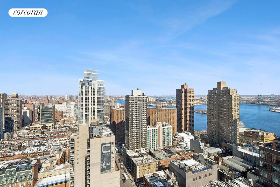 Perched on a high floor with sweeping city and river views, this exceptional corner residence offers a thoughtfully designed two bedroom, two bath layout bathed in brilliant northwestern light.