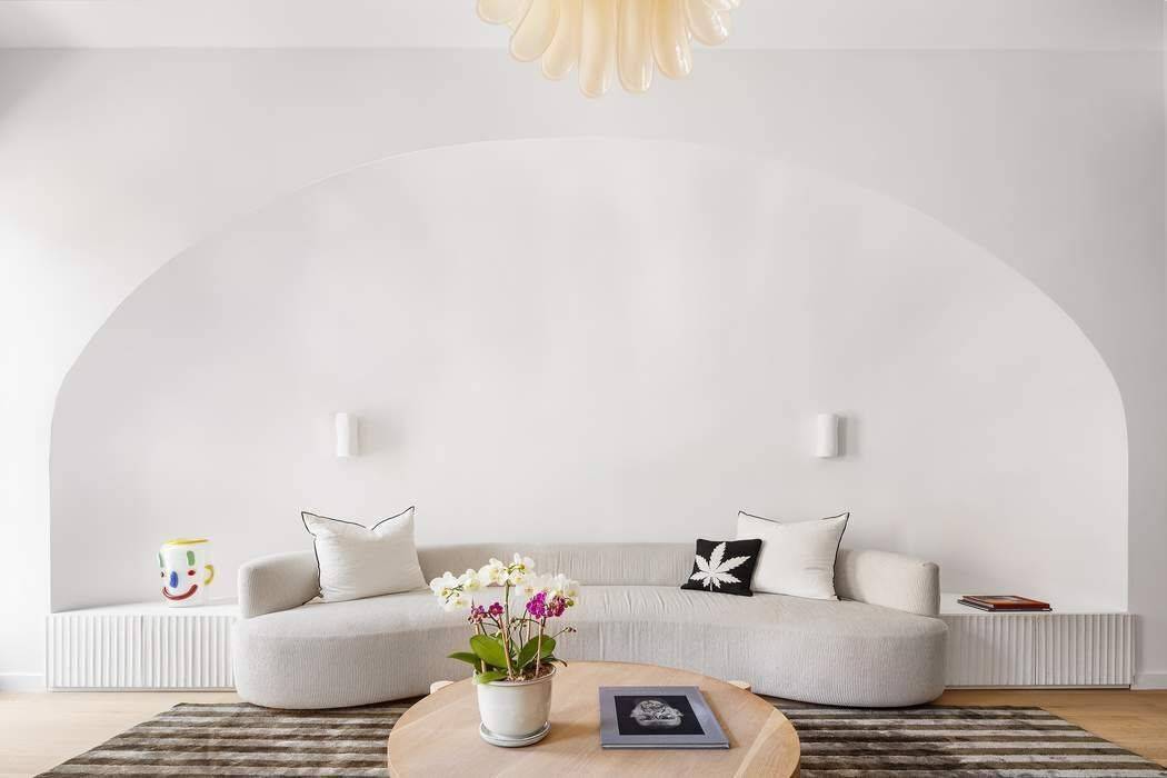 Enter a truly unique property, a rare brownstone condo on one of Chelsea s most coveted, tree lined blocks.