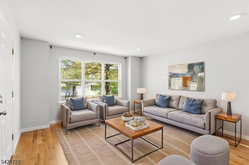 NEWLY BUILT, UNIQUE two family featuring a rare ground level unit with 2 rooms and a full bath, home office, or added flexibility.