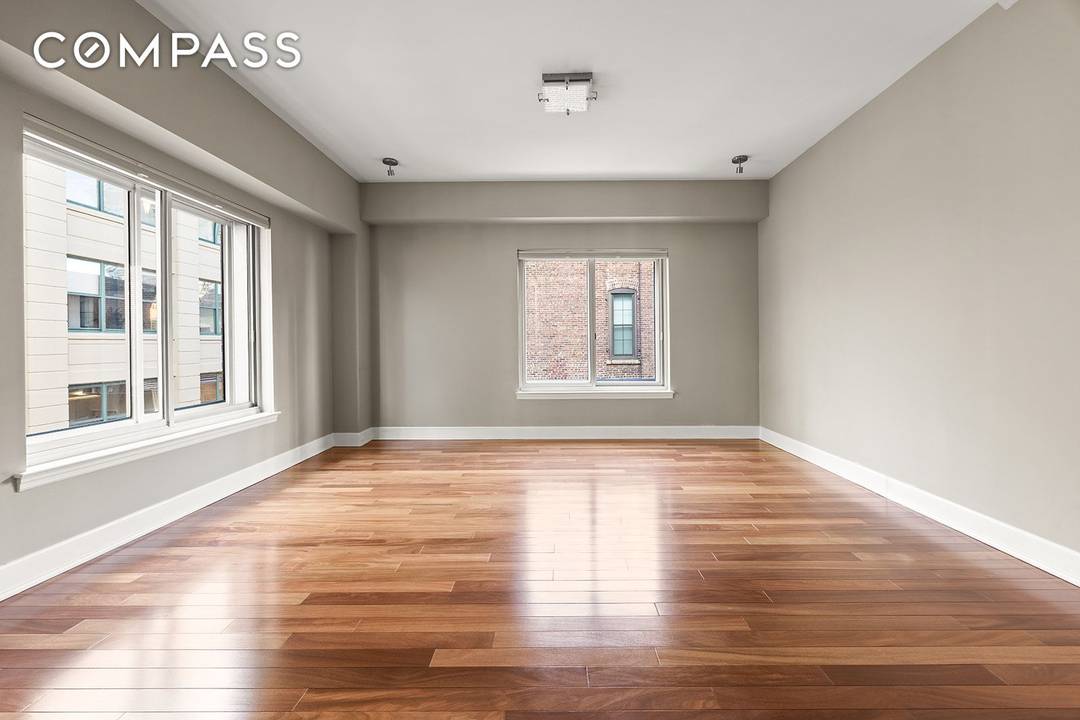 Residence 8E is a fully renovated corner unit the largest one bedroom in the building at 912 square feet with an abundance of natural light, You enter the home through ...