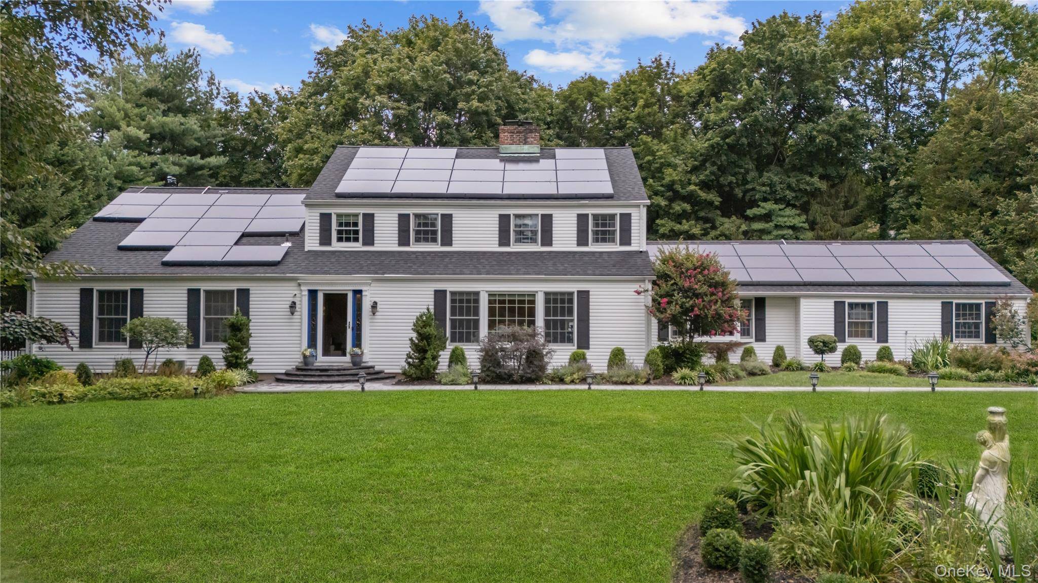Welcome to this magnificent amp ; elegant Center Hall colonial !